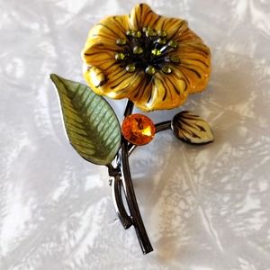 Beautiful enamel painted flower, with gems brooch.